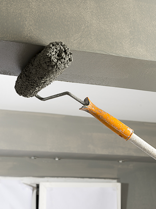 paint roller close up painting commercial property ceiling indianapolis in